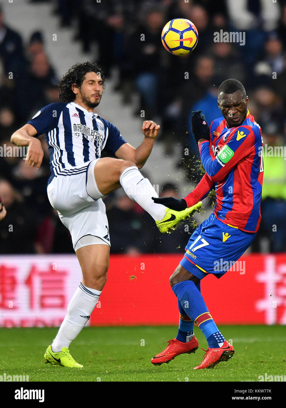 West Bromwich Albion's Ahmed Hegazy (left) and Crystal Palace's Christian Benteke battle for the ball during the Premier League match at The Hawthorns, West Bromwich. PRESS ASSOCIATION Photo Picture date: Saturday December 2, 2017. See PA story SOCCER WBA. Photo credit should read: Anthony Devlin/PA Wire. RESTRICTIONS: No use with unauthorised audio, video, data, fixture lists, club/league logos or 'live' services. Online in-match use limited to 75 images, no video emulation. No use in betting, games or single club/league/player publications. Stock Photo