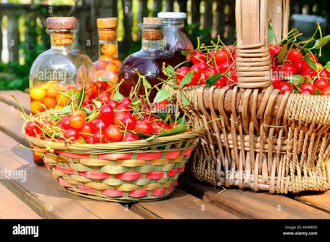 Baskets with cherries to make cherry liqueur Stock Photo Alamy