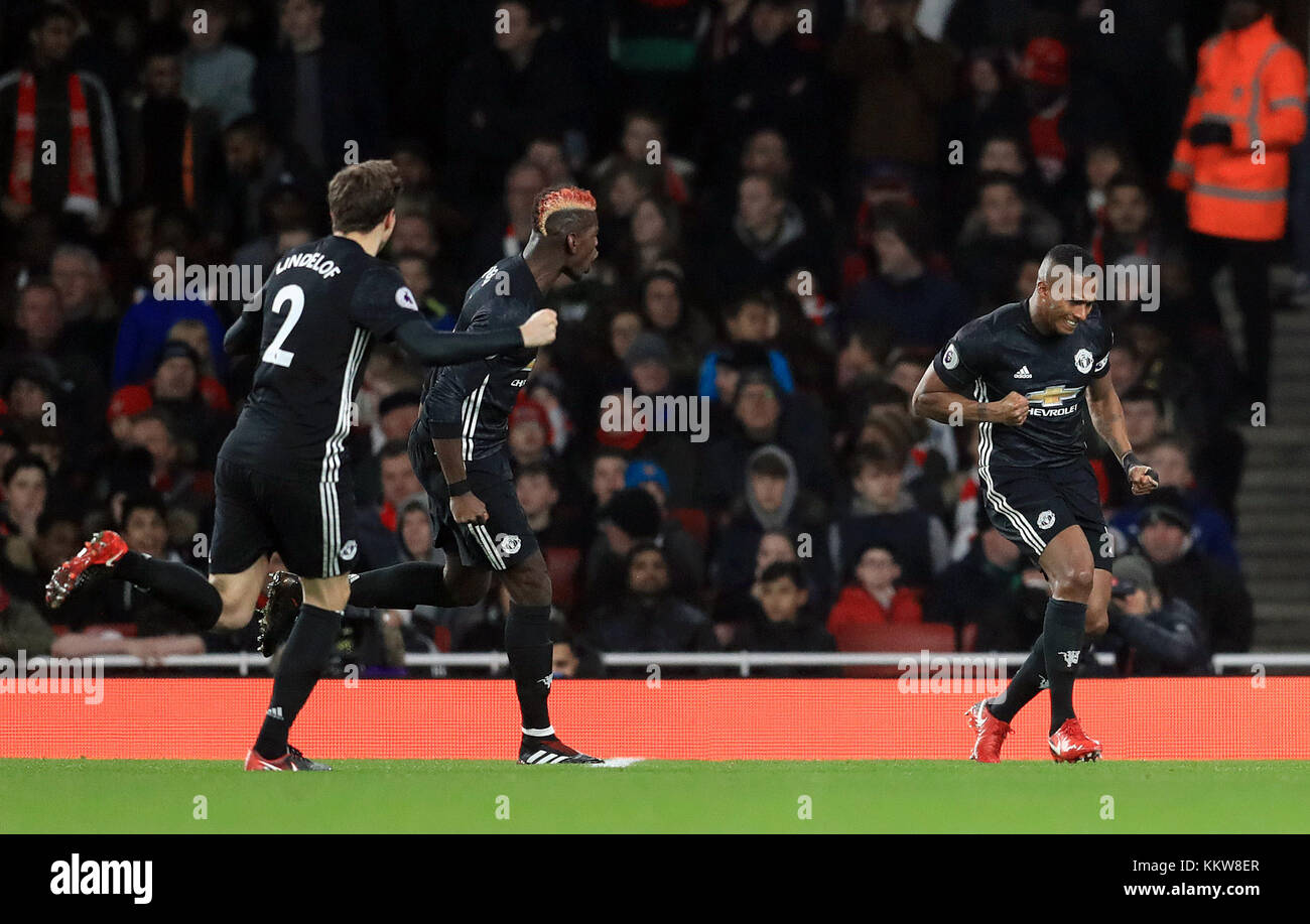 Manchester United's Antonio Valencia (right) celebrates scoring his side's first goal of the game during the Premier League match at the Emirates Stadium, London. PRESS ASSOCIATION Photo Picture date: Saturday December 2, 2017. See PA story SOCCER Arsenal. Photo credit should read: Adam Davy/PA Wire. RESTRICTIONS: No use with unauthorised audio, video, data, fixture lists, club/league logos or 'live' services. Online in-match use limited to 75 images, no video emulation. No use in betting, games or single club/league/player publications. Stock Photo