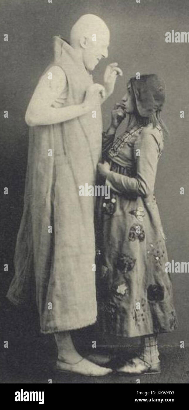 Sugar and Mytyl are characters from Maurice Maeterlinck's play 'The Blue Bird'. The play, a symbolist work, explores themes of happiness and the search for contentment through fantasy and allegory. Stock Photo