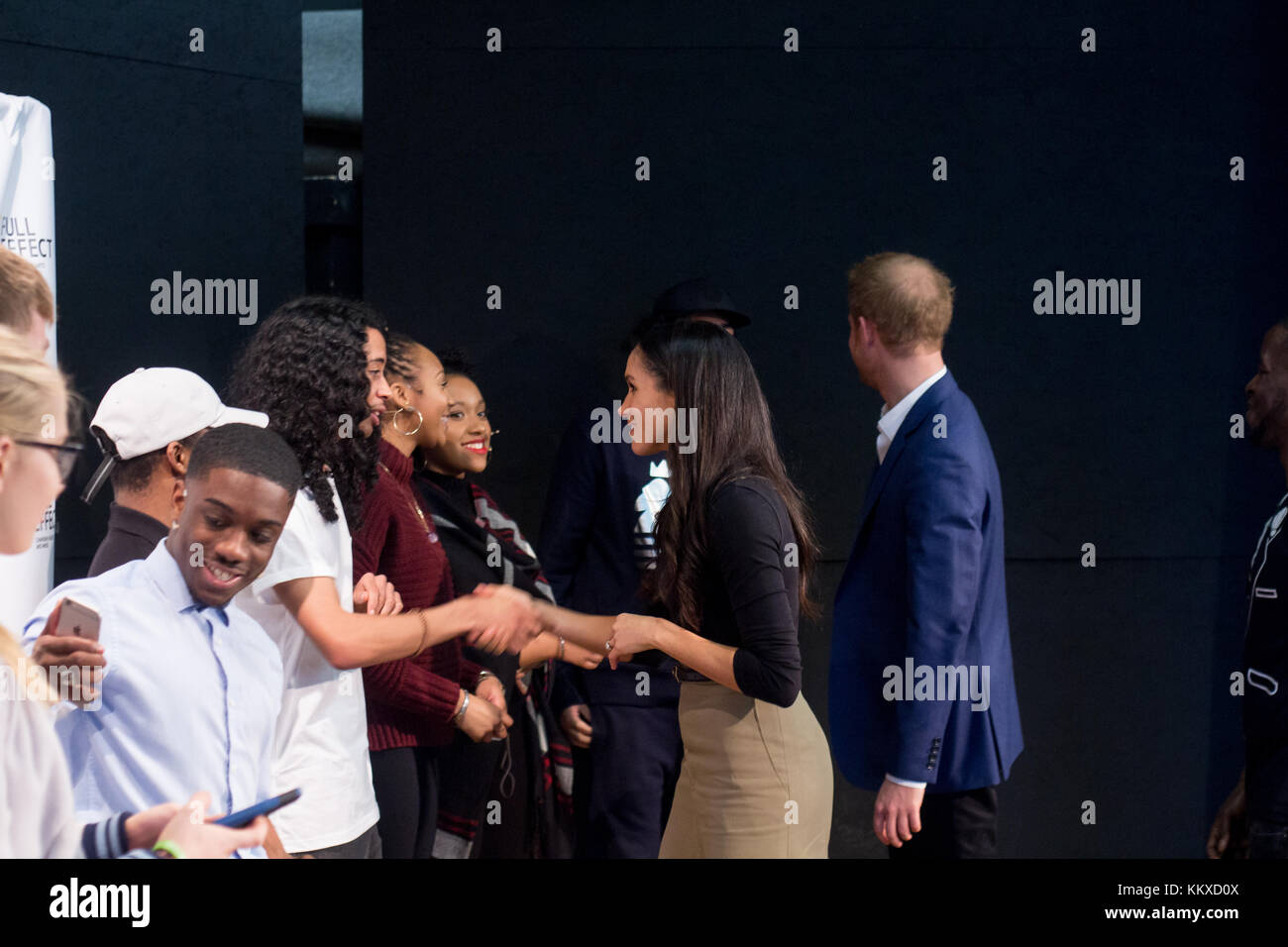 Nottingham, UK. 1st Dec, 2017. Prince Harry's  fiancee US actress Meghan Markle shake hands with the cast and crew of a hip hop opera performed by young people involved in the Full Effect programme at the Nottingham Academy school December 1, 2017 in Nottingham, England. Credit: jamal sterrett/Alamy Live News Stock Photo