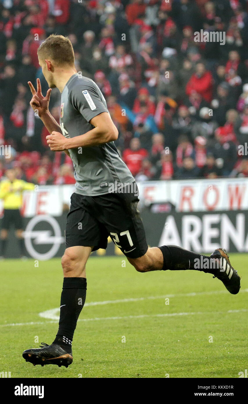 Mainz, Germany. 2nd Dec, 2017. Augsburg's Alfred Finnbogason celebrates after his goal for 2:0 during the German Bundesliga football match between FSV Mainz 05 and FC Augsburg at the Opel Arena in Mainz, Germany, 2 December 2017. (EMBARGO CONDITIONS - ATTENTION: Due to the accreditation guidelines, the DFL only permits the publication and utilisation of up to 15 pictures per match on the internet and in online media during the match.) Credit: Hasan Bratic/dpa/Alamy Live News Stock Photo