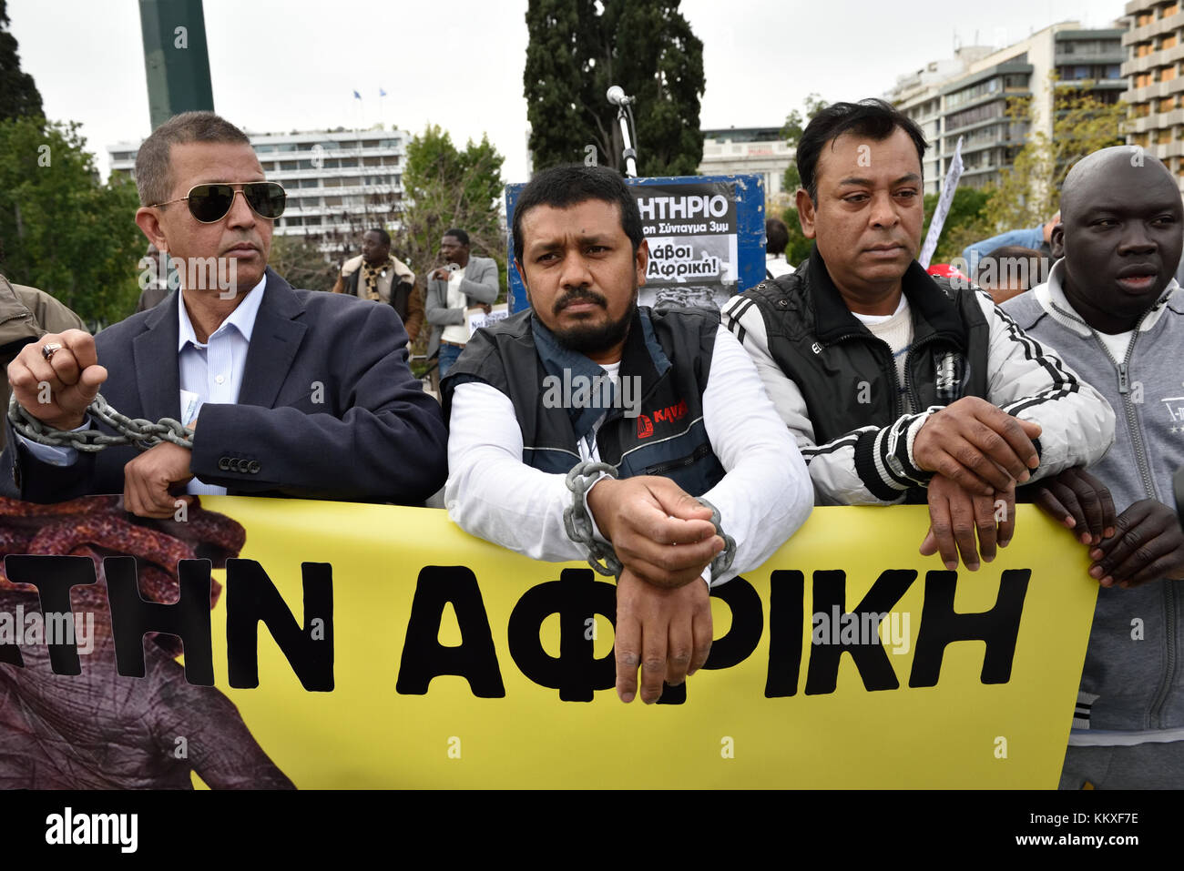 Athens, Greece. 2nd Dec, 2017. Protesters with chained hands rally  against slave trade in Africa, in Athens, Greece. Credit: Nicolas Koutsokostas/Alamy Live News. Stock Photo