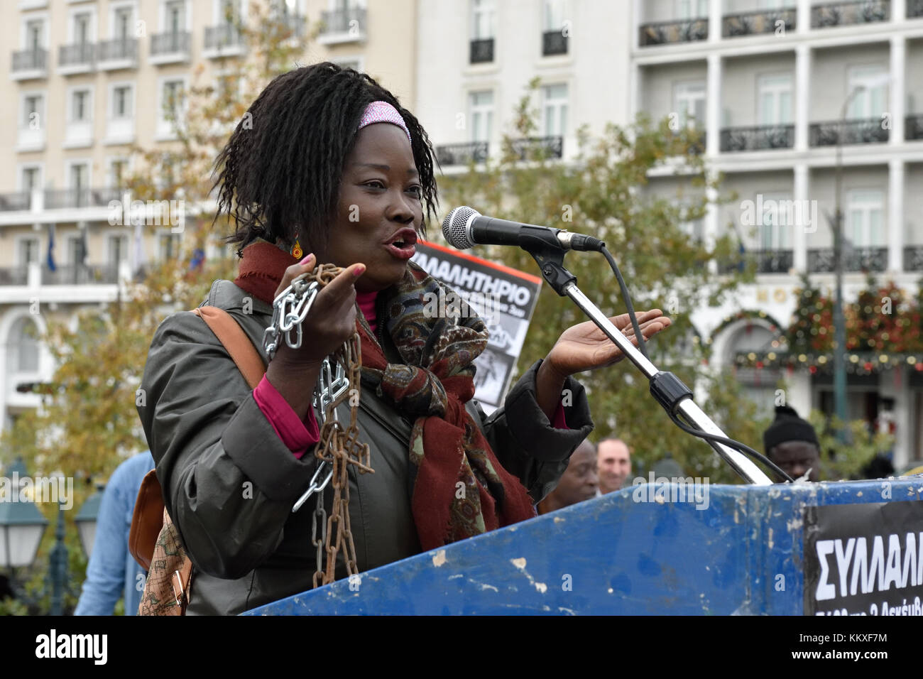 Athens, Greece. 2nd Dec, 2017. A speaker with chained hands addresses protesters during the rally against slave trade in Africa, in Athens, Greece. Credit: Nicolas Koutsokostas/Alamy Live News. Stock Photo