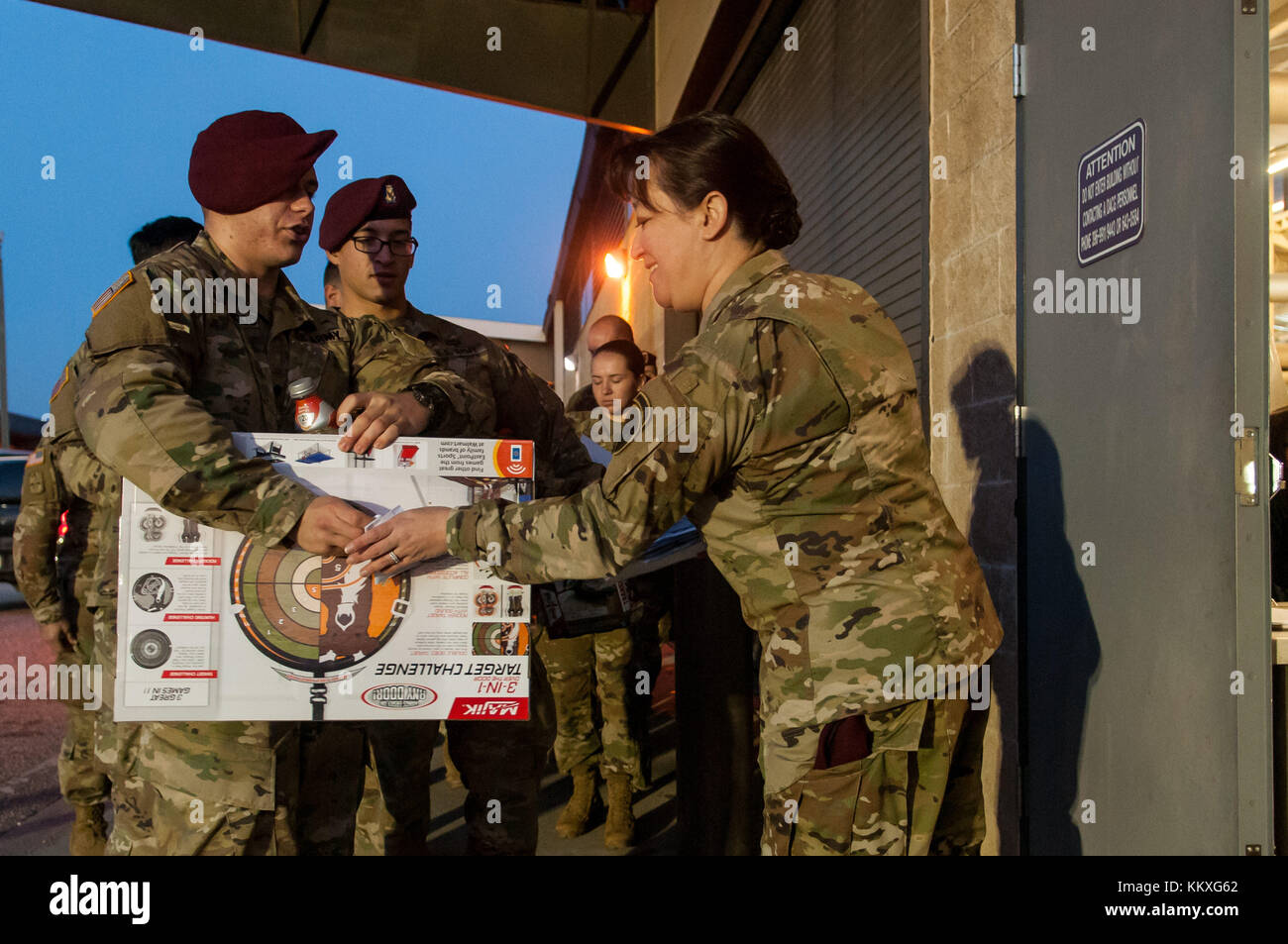 Fort Bragg, NC, USA. 1st Dec, 2017. Dec. 1, 2017 - FORT BRAGG, N.C., USA - Paratroopers enter the passenger shed at Green Ramp on Pope Army Airfield, Friday, to donate their toys at the 20th Annual Randy Oler Memorial Operation Toy Drop. The airborne operation, hosted by the U.S. Army Civil Affairs & Psychological Operations Command (Airborne), is the world's largest combined airborne operation with paratroopers from nine allied nations participating. The annual event allows paratroopers the opportunity to help children in communities surrounding Fort Bragg receive donated toys Stock Photo