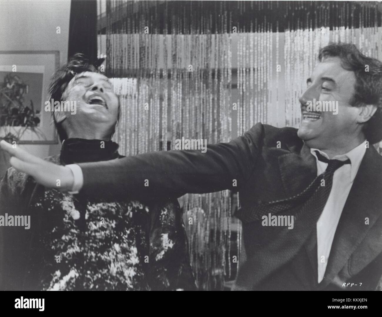 1975 - PETER SELLERS, BURT KWOUK. The Return of the Pink Panther. Credit: Entertainment Pictures, Inc/Entertainment Pictures/ZUMA Wire/Alamy Live News Stock Photo