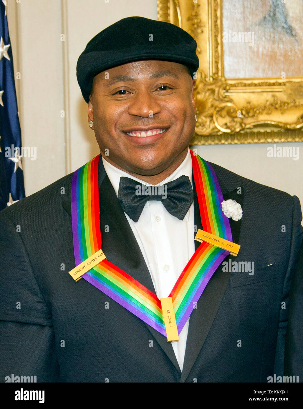 LL COOL J, one of he five recipients of the 40th Annual Kennedy Center Honors with his award as he poses for a group photo following a dinner hosted by United States Secretary of State Rex Tillerson in their honor at the US Department of State in Washington, DC on Saturday, December 2, 2017. The 2017 honorees are: American dancer and choreographer Carmen de Lavallade; Cuban American singer-songwriter and actress Gloria Estefan; American hip hop artist and entertainment icon LL COOL J; American television writer and producer Norman Lear; and American musician and record producer Lionel Richie Stock Photo