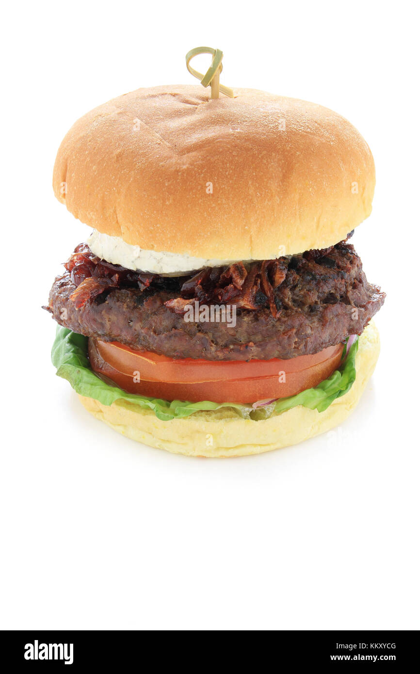 gourmet beefburger with goats cheese isolated Stock Photo Alamy