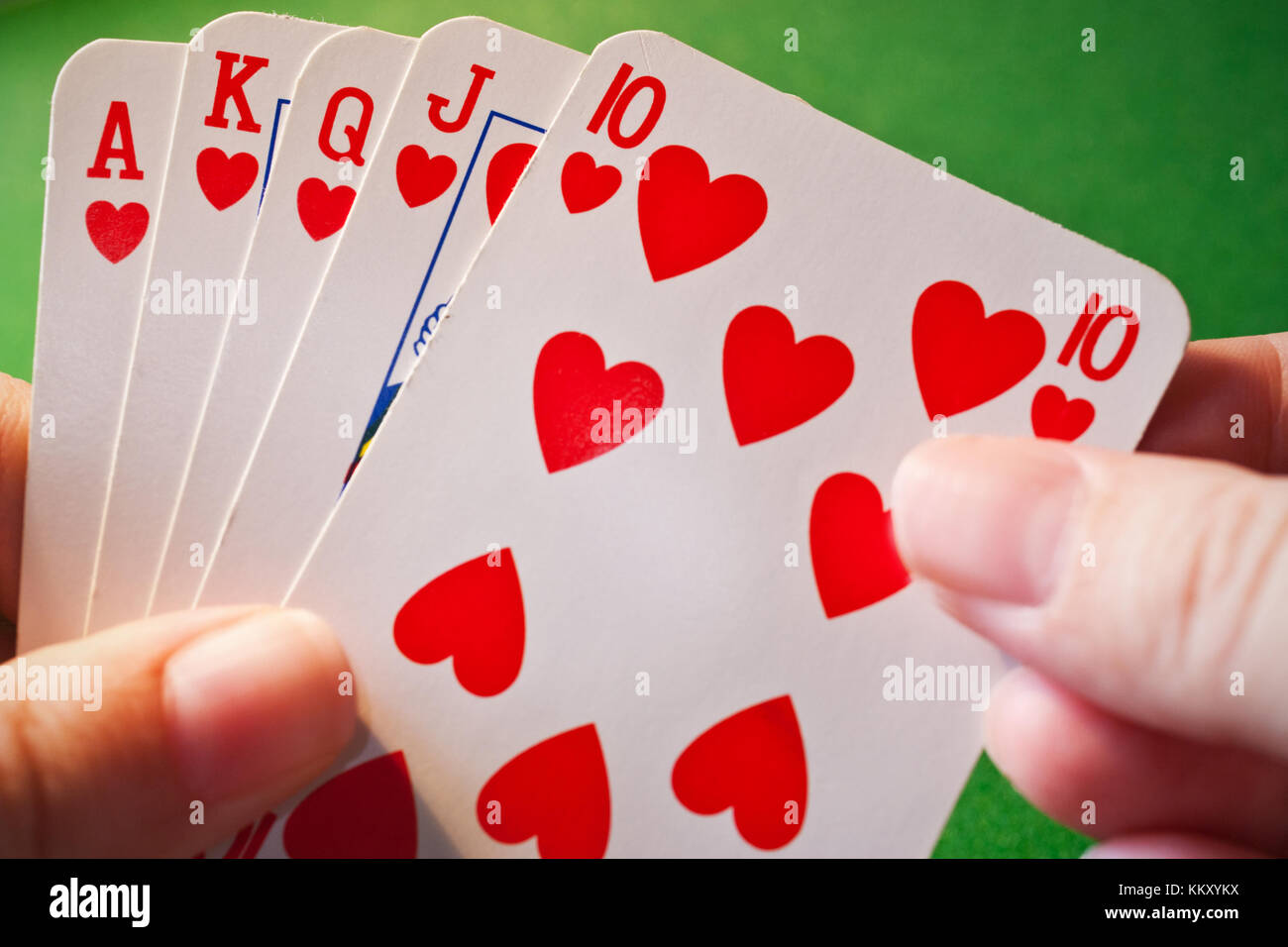 playing cards / player hand with cards Stock Photo Alamy