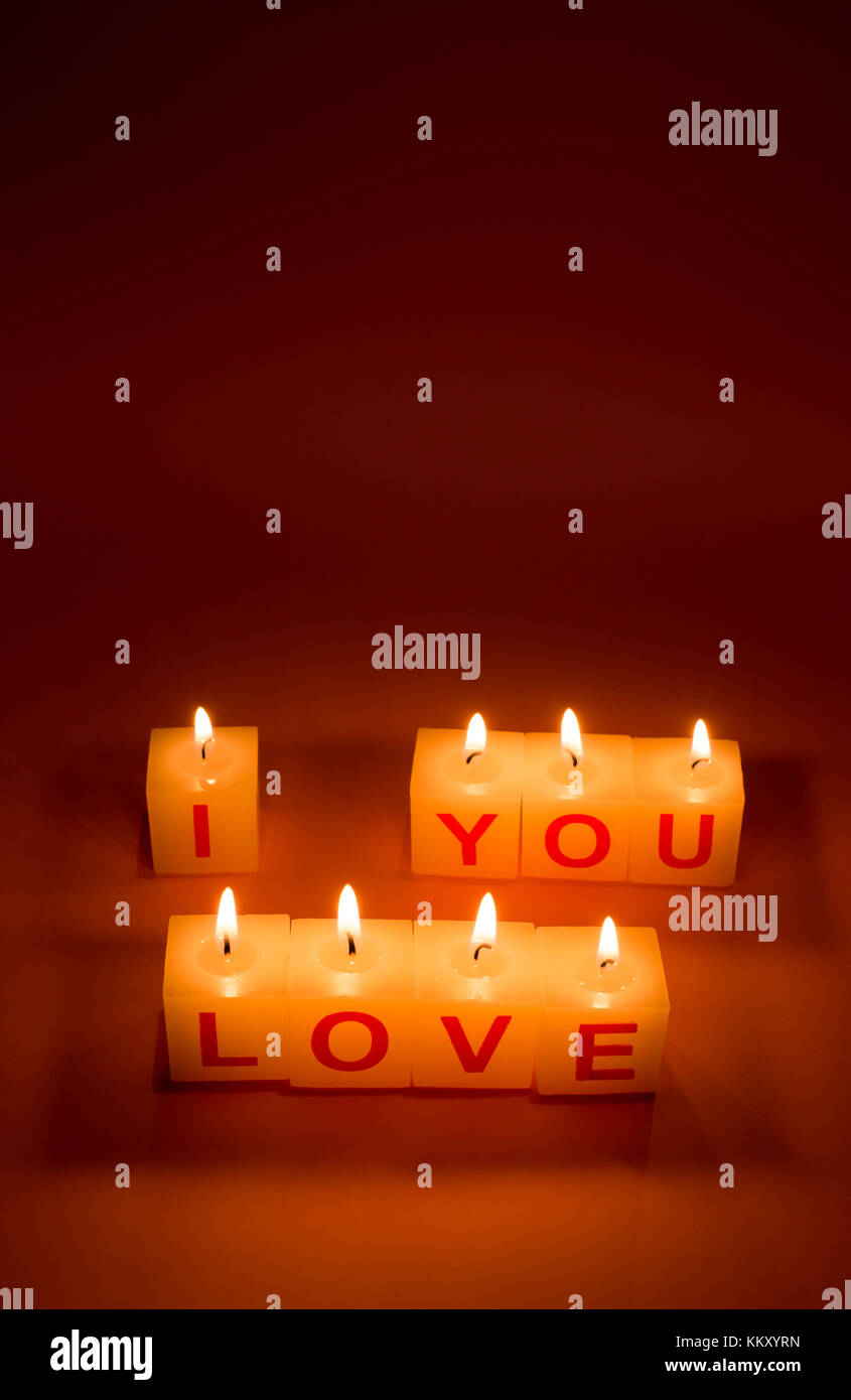I Love You Words On Candle Lights On Pink Background Stock Photo