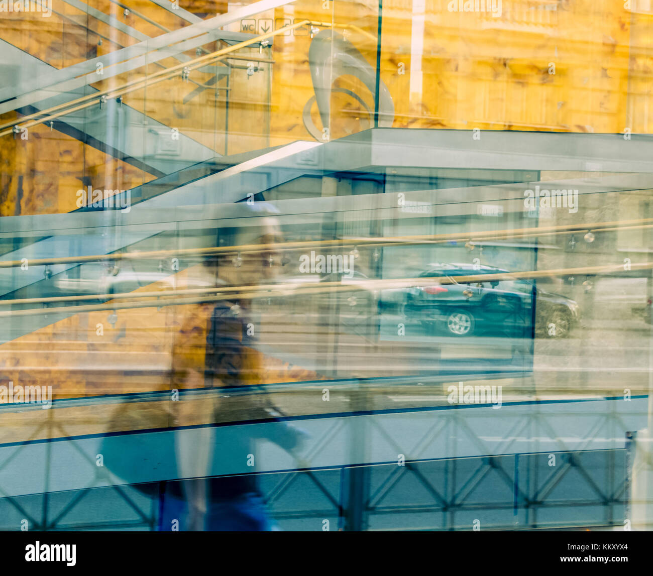 a person's reflection in the building of big-city life Stock Photo