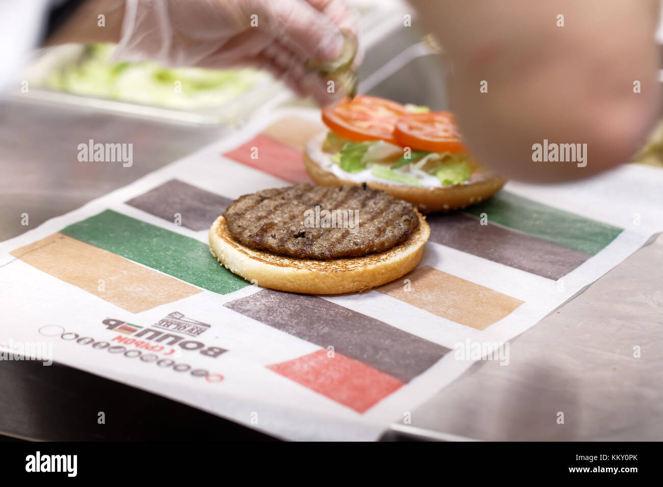 St. Petersburg, Russia - November 29, 2017: Staff preparing a Whopper in  500th Burger King restaurant in Russia in the day of opening. First Burger  Ki Stock Photo - Alamy