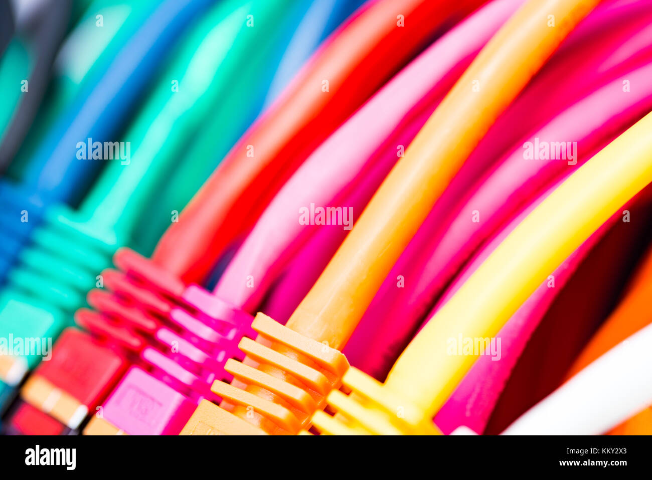 Colorful network cables connected to a switch Stock Photo