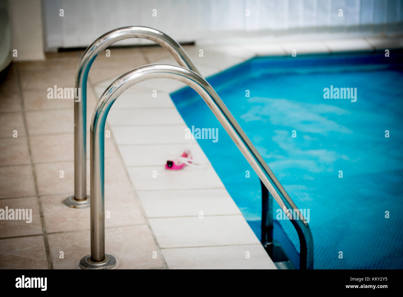 Indoor Swimming Pool with ladder Stock Photo