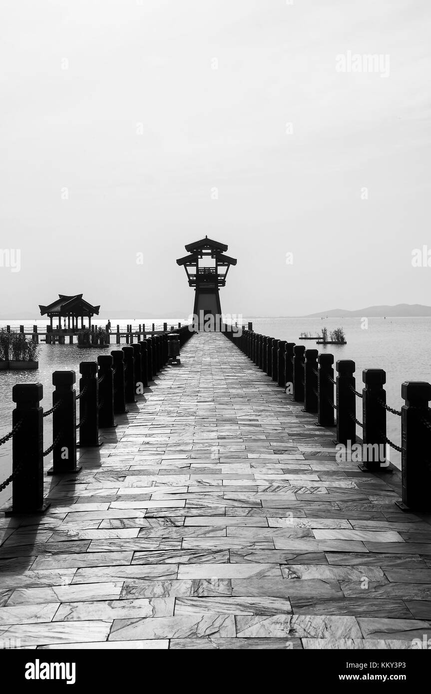 The three kingdoms scenic area walkway and towers in the Wuxi China on Tai lake or taihu in Jiangsu province. Stock Photo