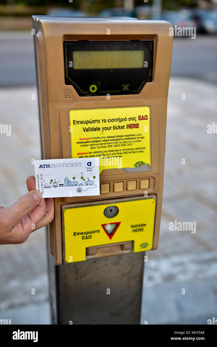 Transport ticket validation machine for  travel on any metro, tram, train or bus for Athens, Greece Stock Photo