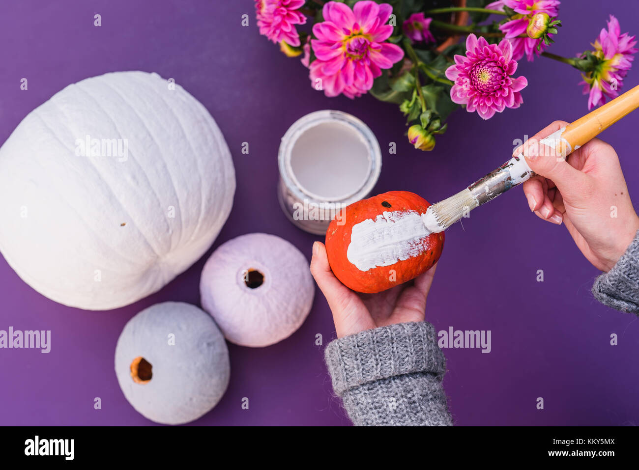 Woman, detail, hands, pumpkins, chalk colour, brush, flowers, Stock Photo