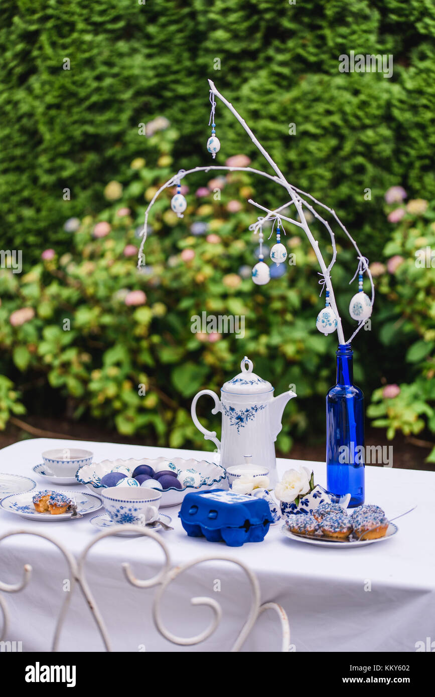 Garden table, Easter decoration, blue tones, Stock Photo