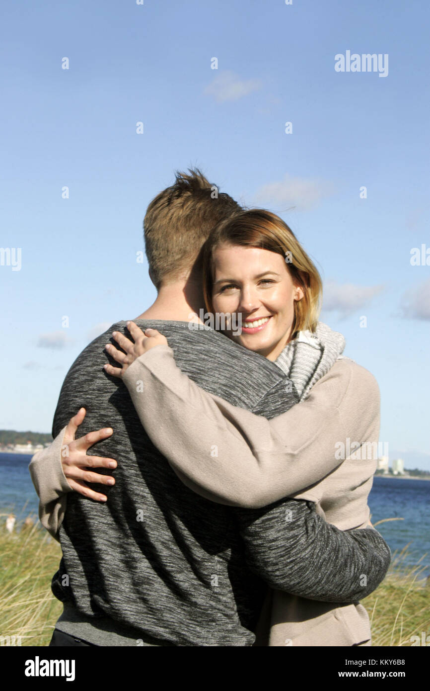 Couple in love, embrace, Baltic Sea, dunes, Stock Photo
