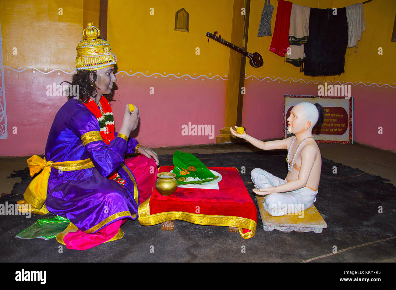 Saint Namdev offering Prasad (Naivedya) to Lord Vithoba, Sant Darshan Museum, Hadashi, Maharashtra, India Stock Photo