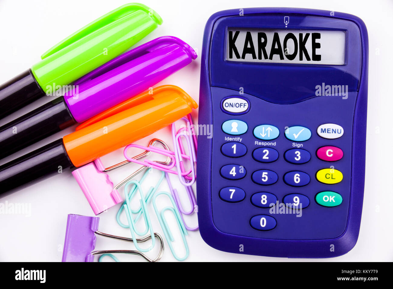 Writing word Karaoke text in the office with surroundings such as marker,  pen writing on calculator. concept for Singing Karaoke Music white  backgroun Stock Photo - Alamy
