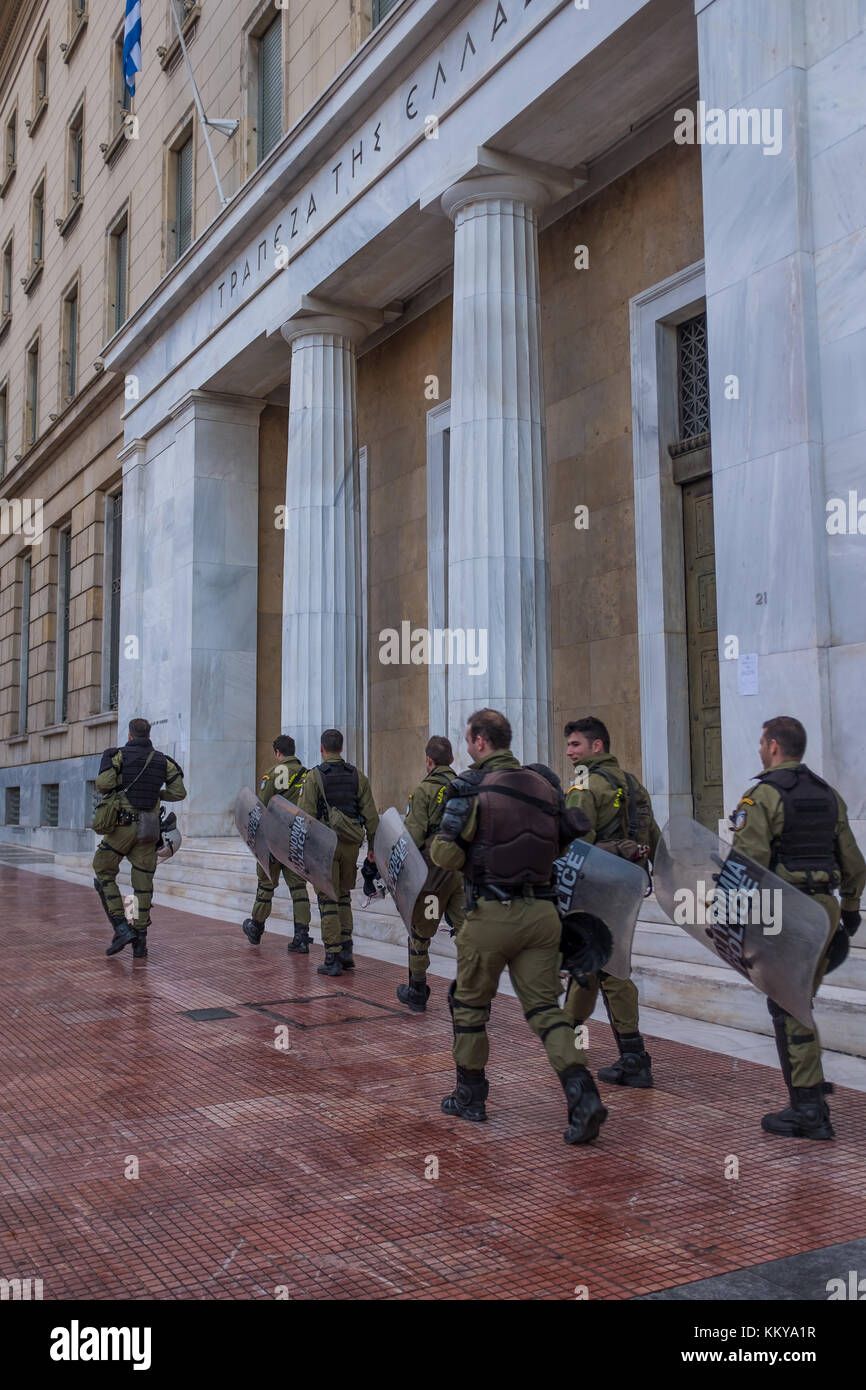 ATHENS, GREECE - NOVEMBER 18 2017: Riot police with their shield, take ...