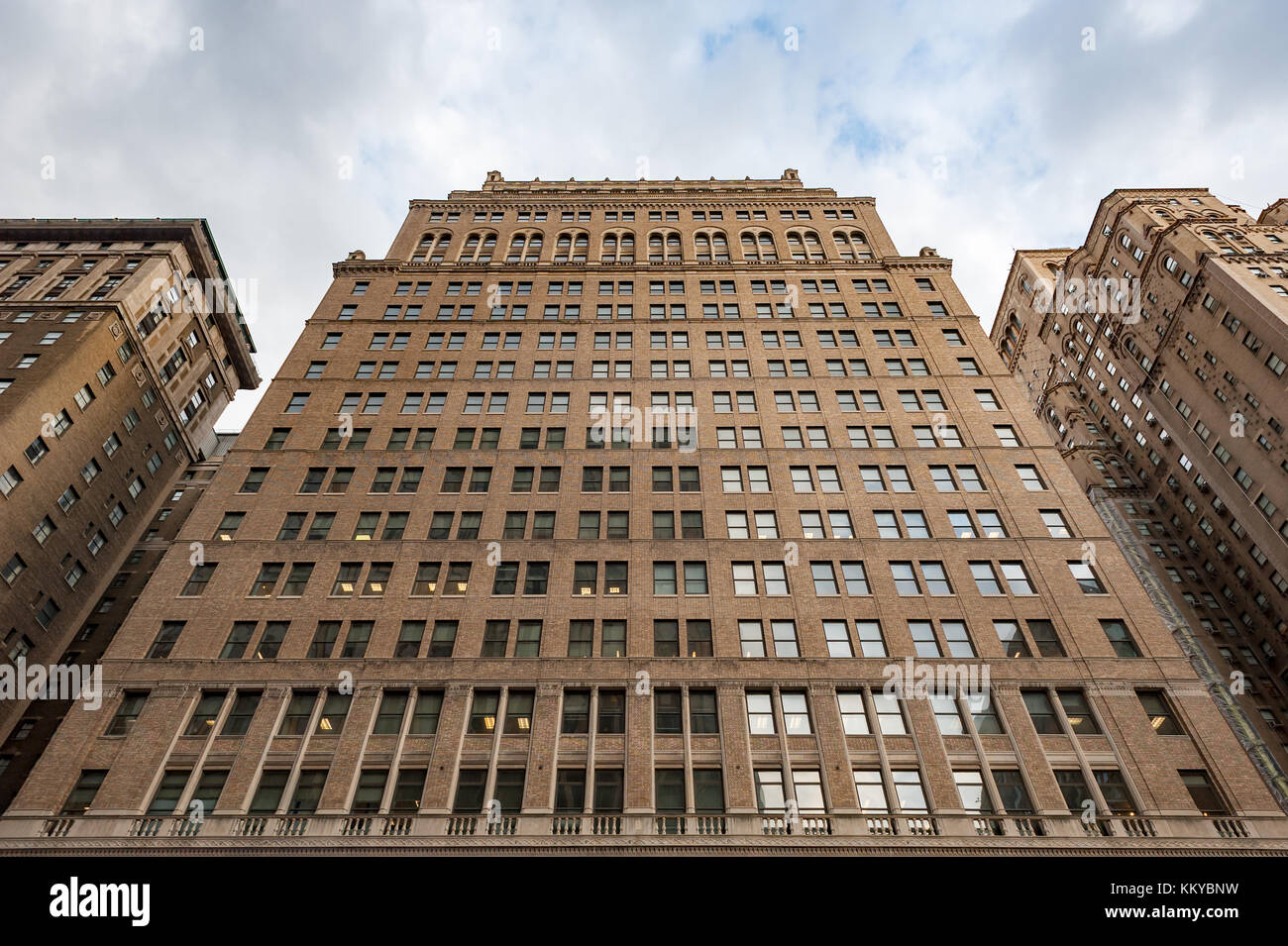 New York City, USA - Nov 10, 2017 : New york City building low angle view at the angle of 7th ave and w31st Stock Photo