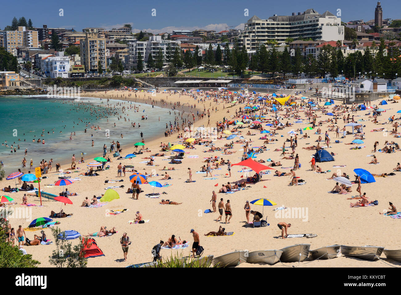 Sunbathers on Coogee Beach, Coogee, an eastern suburb of Sydney, New South Wales, Australia Stock Photo