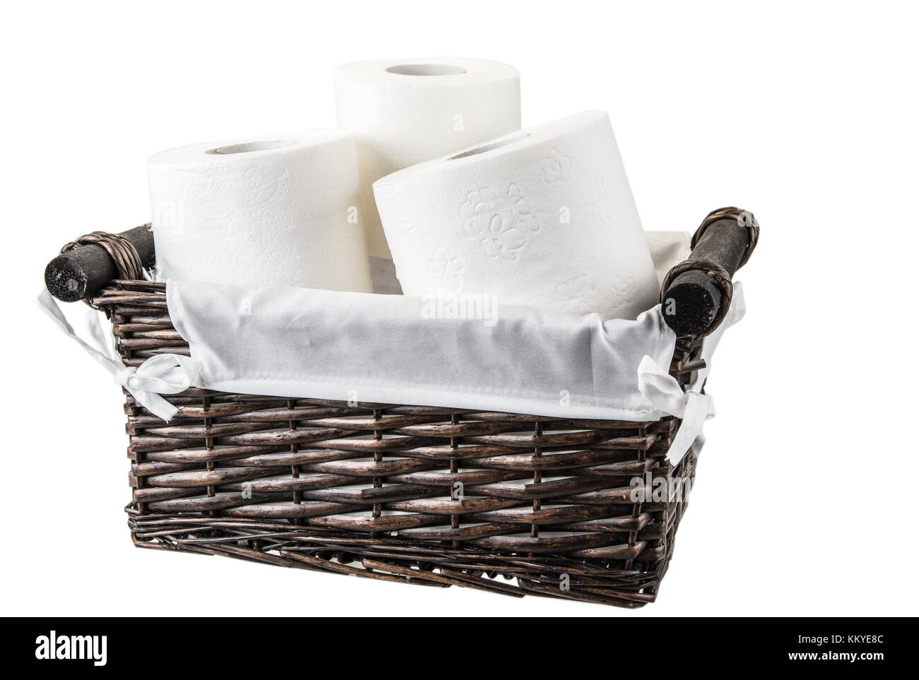 Basket full of toilet paper on the white background Stock Photo