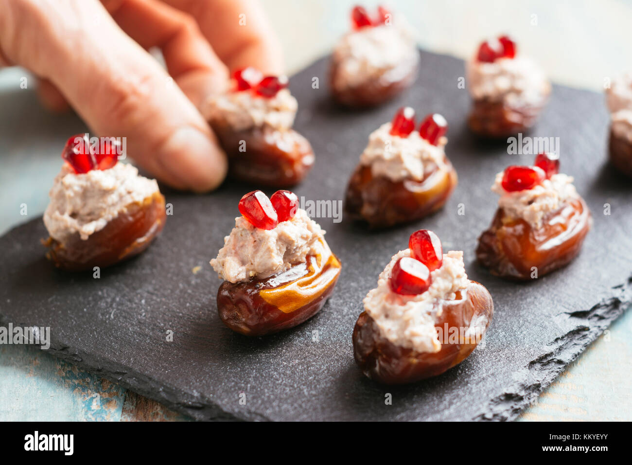 Walnut and Vegan Cream Cheese Filled Dates Stock Photo Alamy