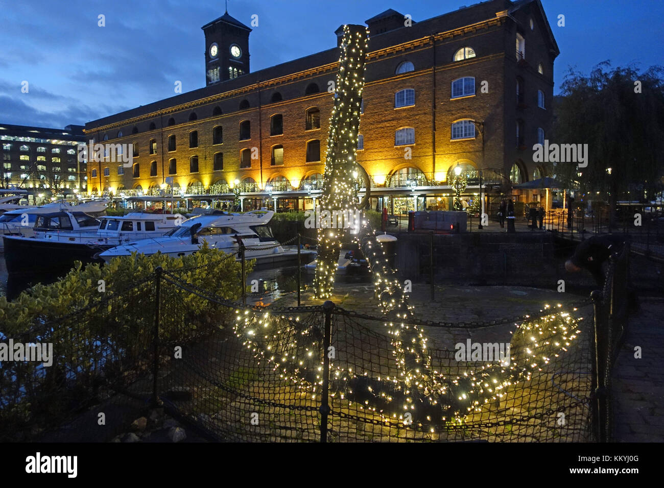 View of an anchor decorated with Christmas lights at night in St Katharine Docks in Central London UK Stock Photo