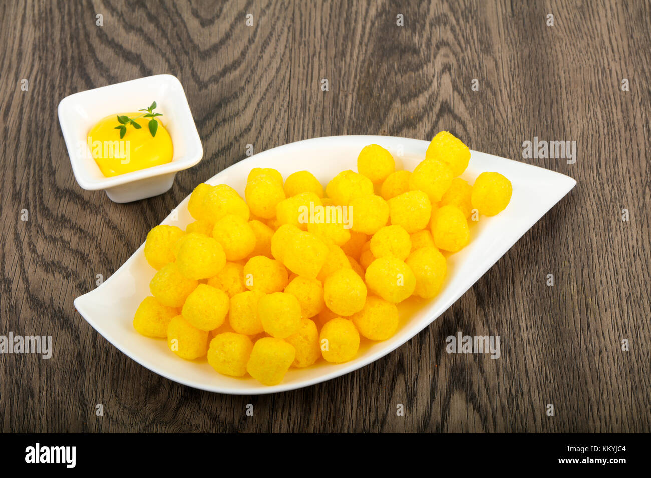 Cheese corn balls with sauce Stock Photo Alamy