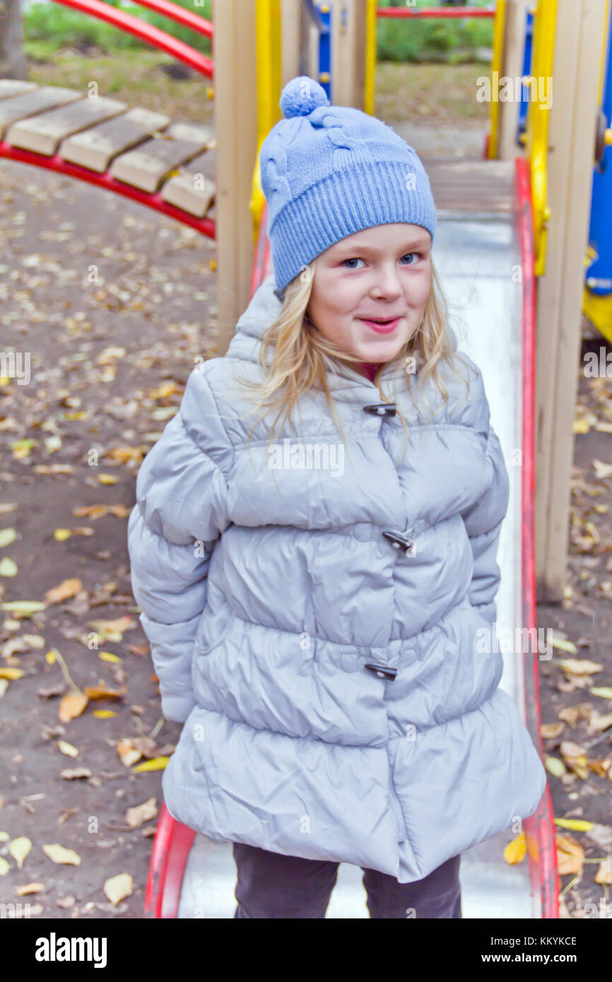 Photo of cute smiling girl in autumn Stock Photo - Alamy
