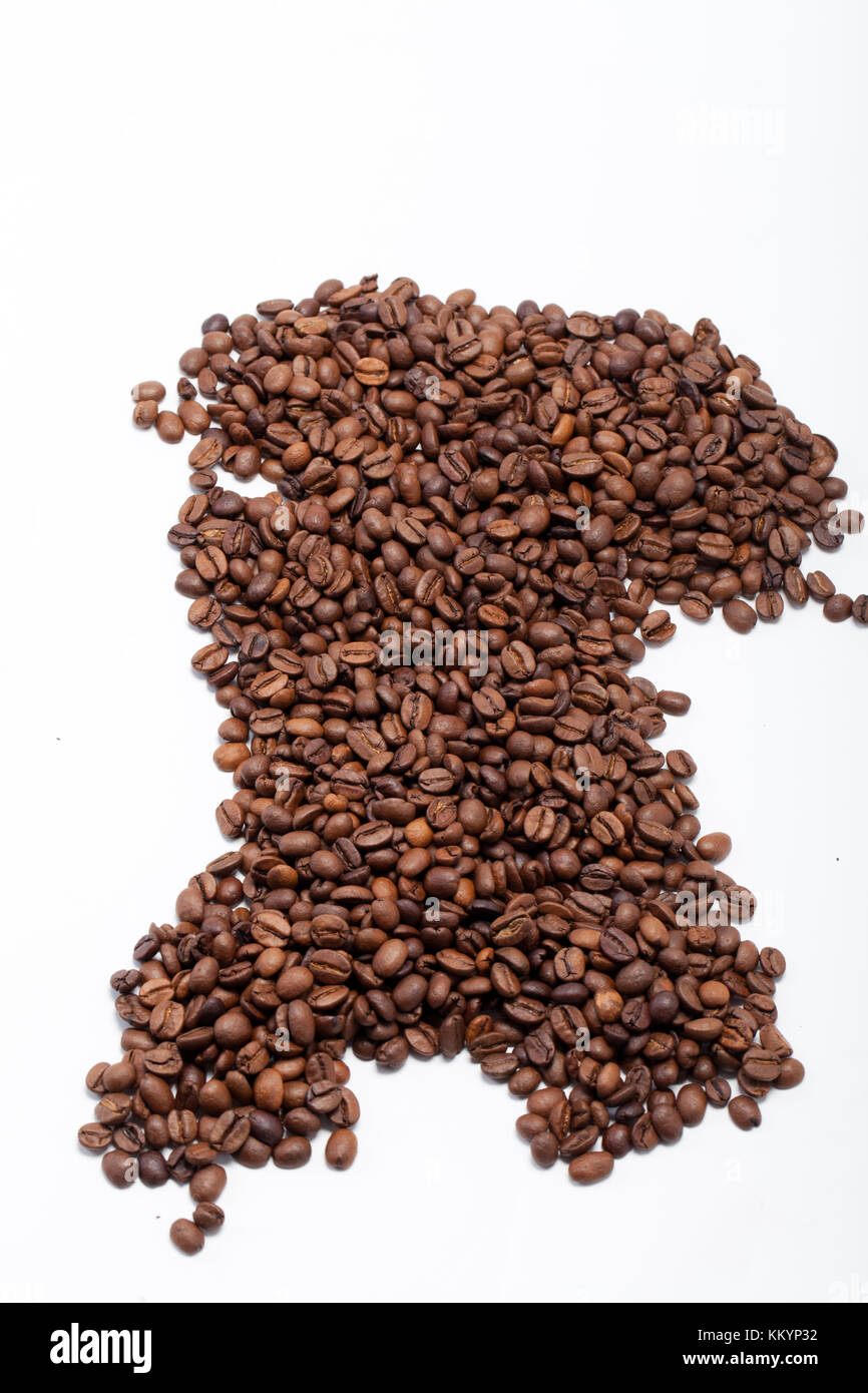 coffee beans close up isolated on white Stock Photo - Alamy