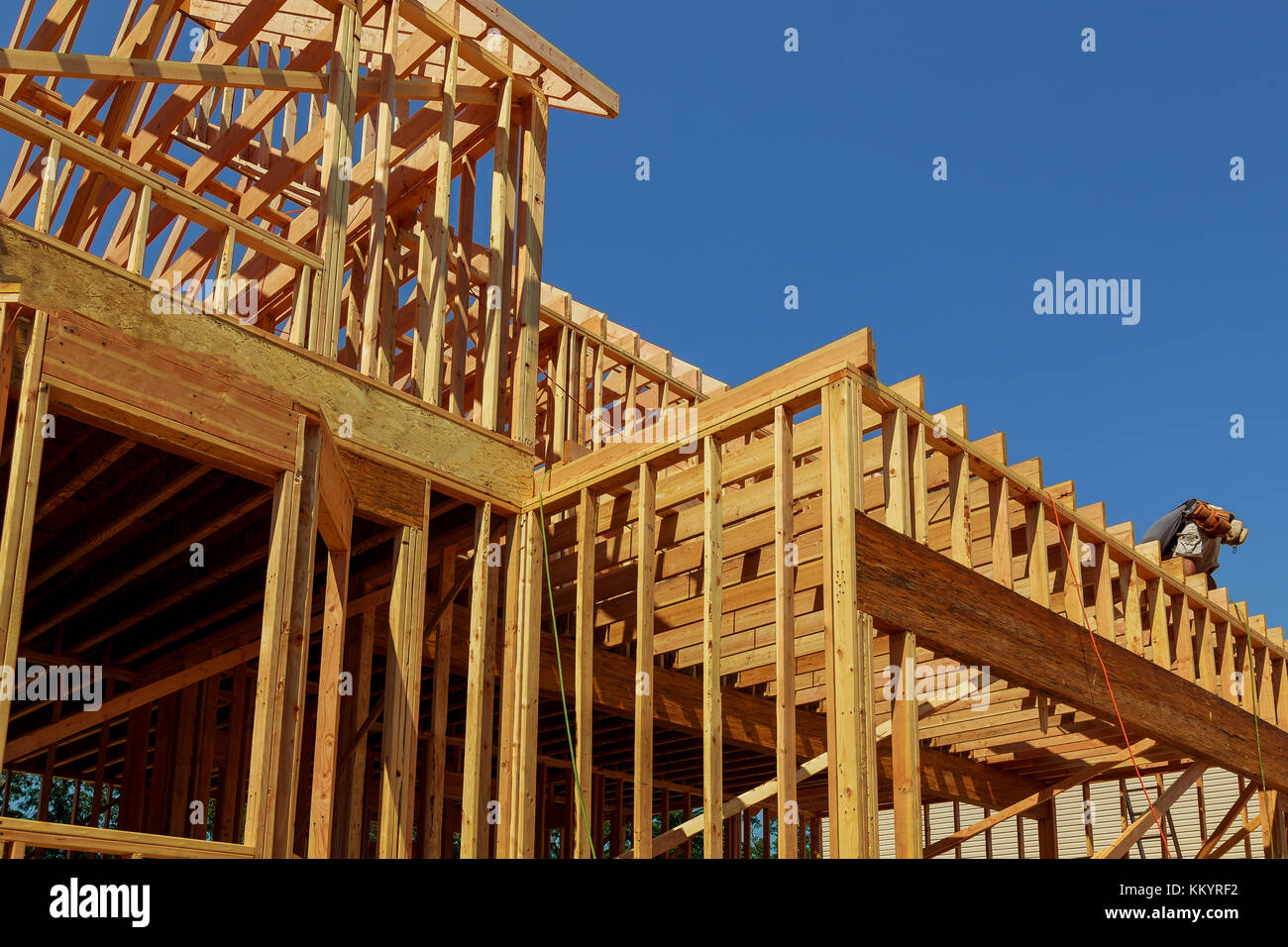 New Construction Wood Home Framing Abstract. New construction home framing Stock Photo