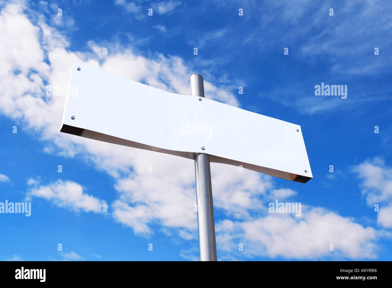 Blank sign set against a partly cloudy blue sky Stock Photo - Alamy