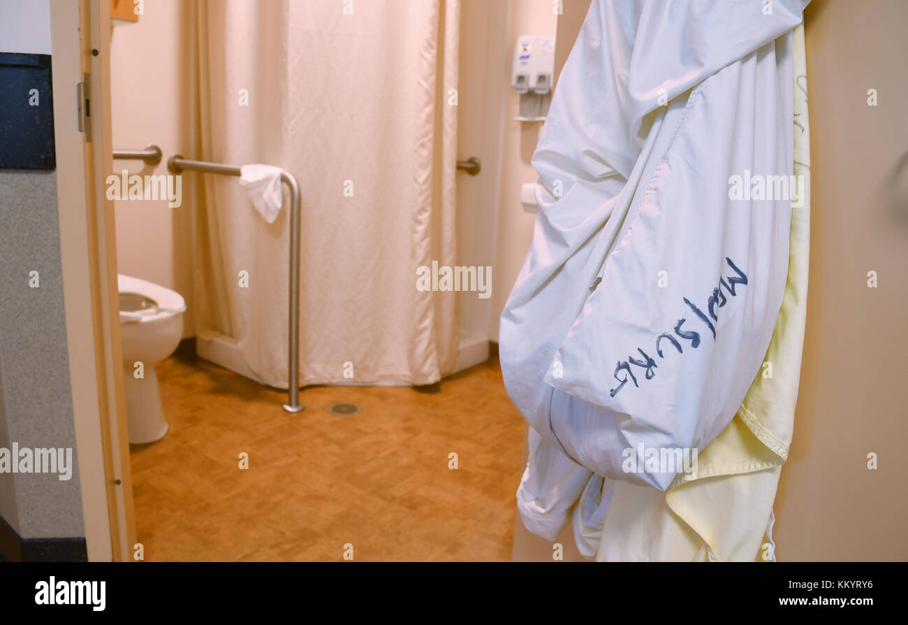Laundry bag hanging on a hospital bathroom door Stock Photo Alamy