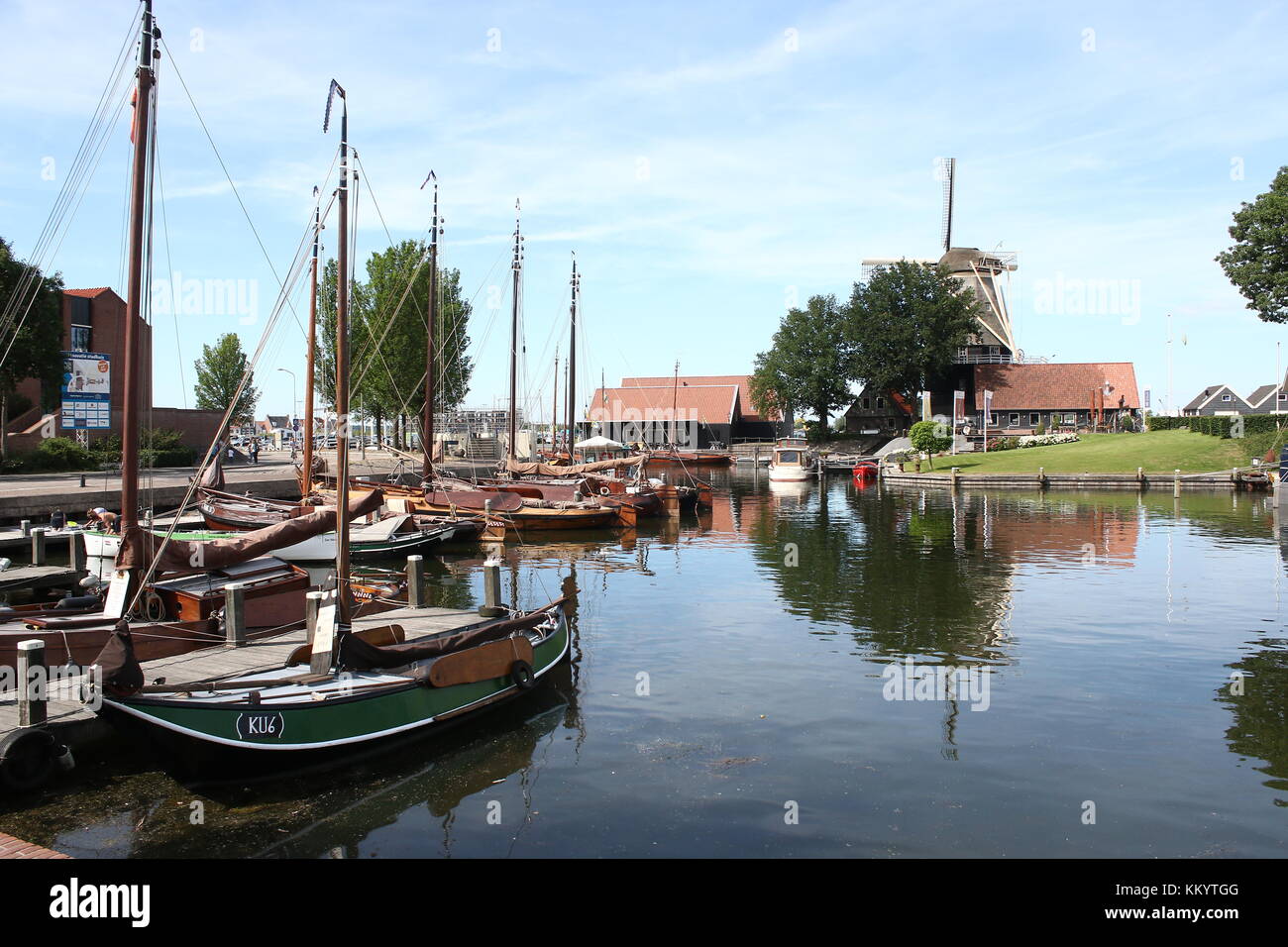 Harderwijk Vissershaven (Fishing Harbour, nowadays recreational), Harderwijk, The Netherlands. In background corn mill De Hoop. Stock Photo