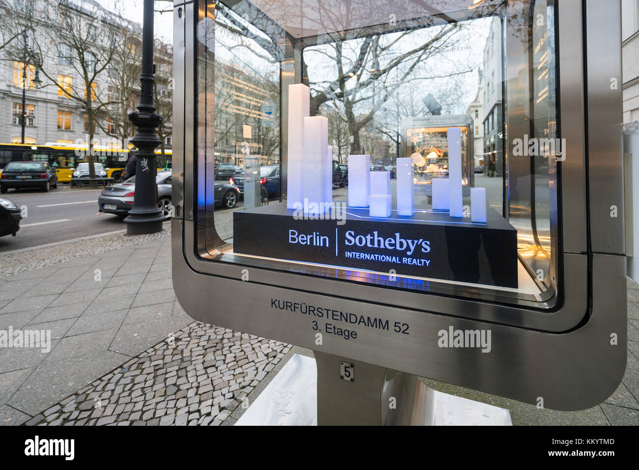 Sotheby's International Reality glass cabinet  on famous Kurfurstendamm shopping street in Berlin, Germany. Stock Photo
