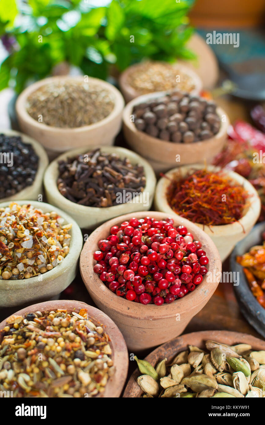 Variety of different asian and middle east spices, colorful assortment ...