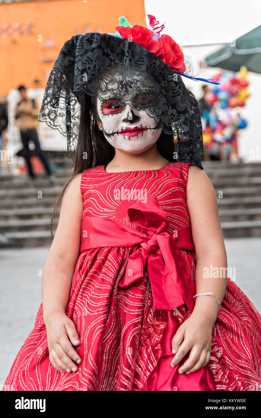 A young Mexican girl dressed in La Calavera Catrina costume for the Day of  the Dead or Día de Muertos festival October 29, 2017 in San Miguel de  Allende, Guanajuato, Mexico. The