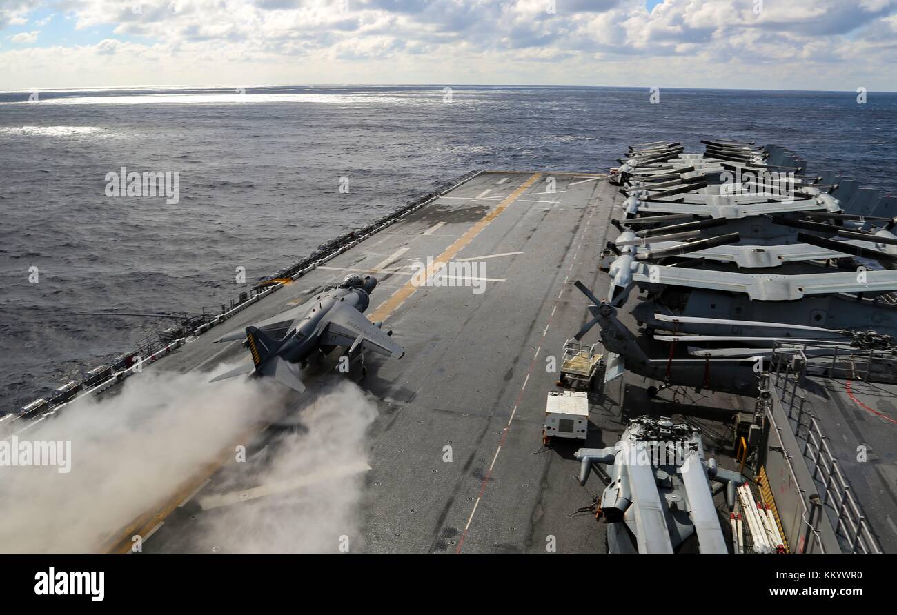 A U.S. Marine Corps AV-8B Harrier II ground-attack aircraft takes off from the flight deck of the U.S. Navy Wasp-class amphibious assault ship USS Iwo Jima November 24, 2017 in the Atlantic Ocean.  (photo by Jon Sosner via Planetpix) Stock Photo