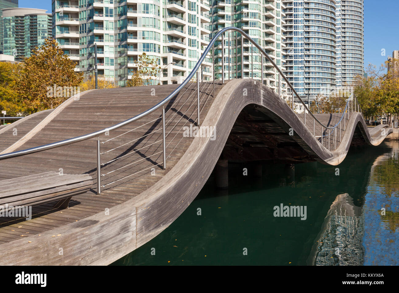 Toronto, Canada - Oct 20, 2017: The Toronto Waterfront Wavedecks - a wave shaped pedestrian bridge at the waterfront promenade in Toronto, Canada Stock Photo