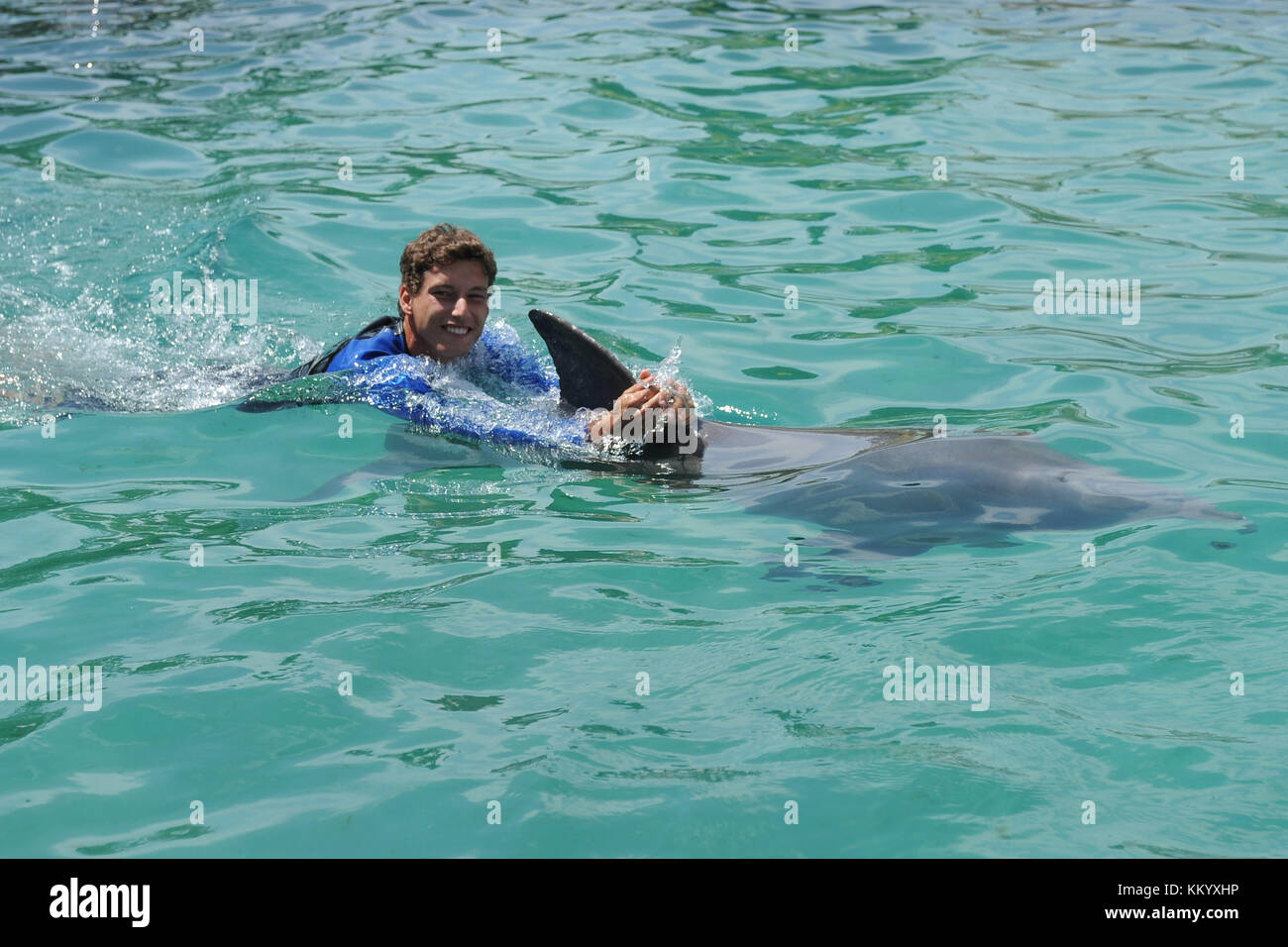 KEY BISCAYNE, FL - MARCH 18: Ana Ivanovic of Serbia swims with dolphins
