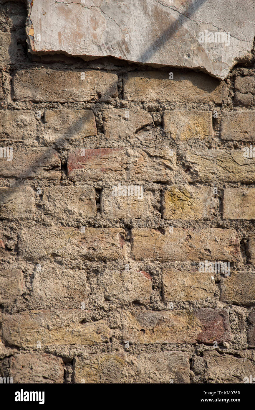 Old grunge brick wall as a background Stock Photo - Alamy