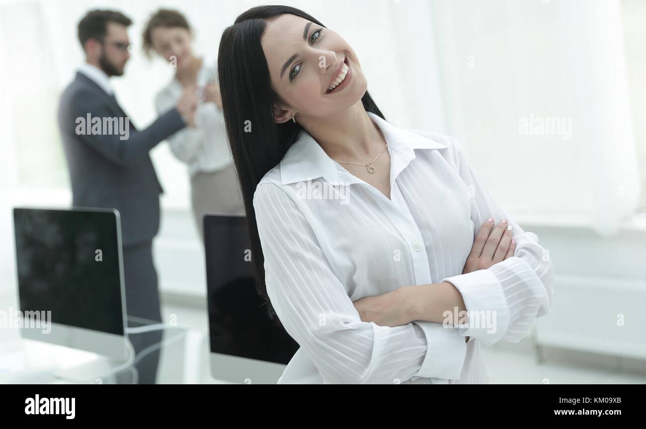 successful young business woman on the background of a workplace Stock ...