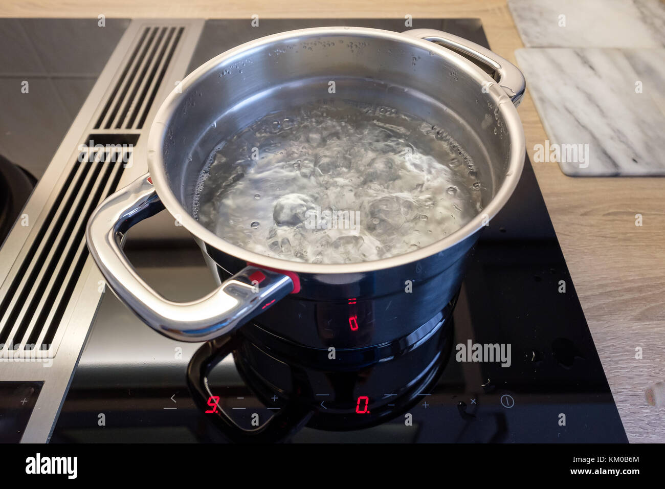 Boiling Pot Of Water On Hot Electric Burner Stock Photo, Picture and  Royalty Free Image. Image 34317573.