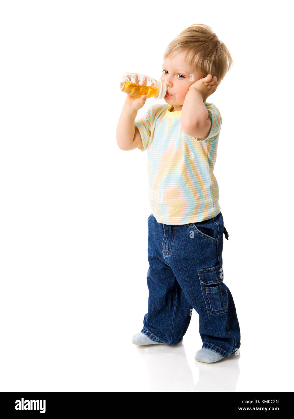 Thirsty Boy drinking juice isolated on white Stock Photo - Alamy