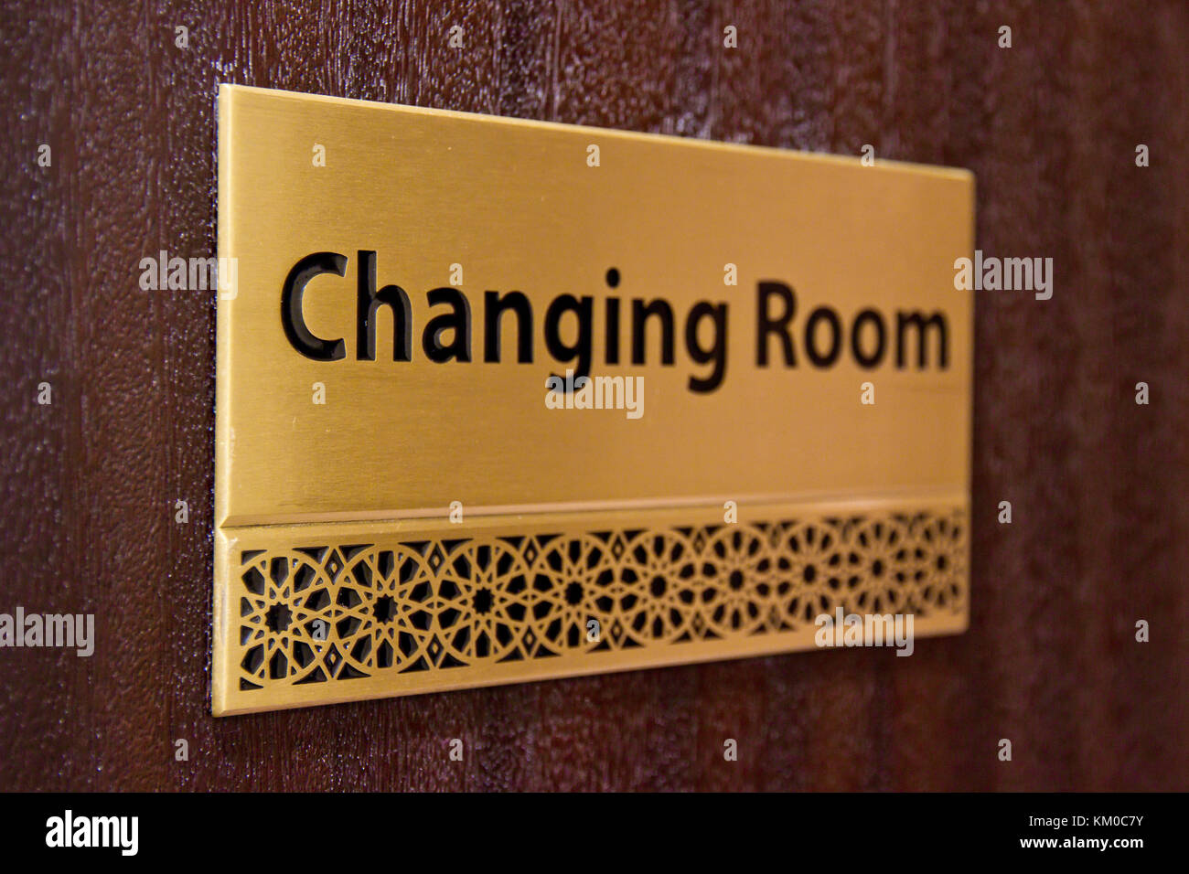 Golden changing room sign Stock Photo