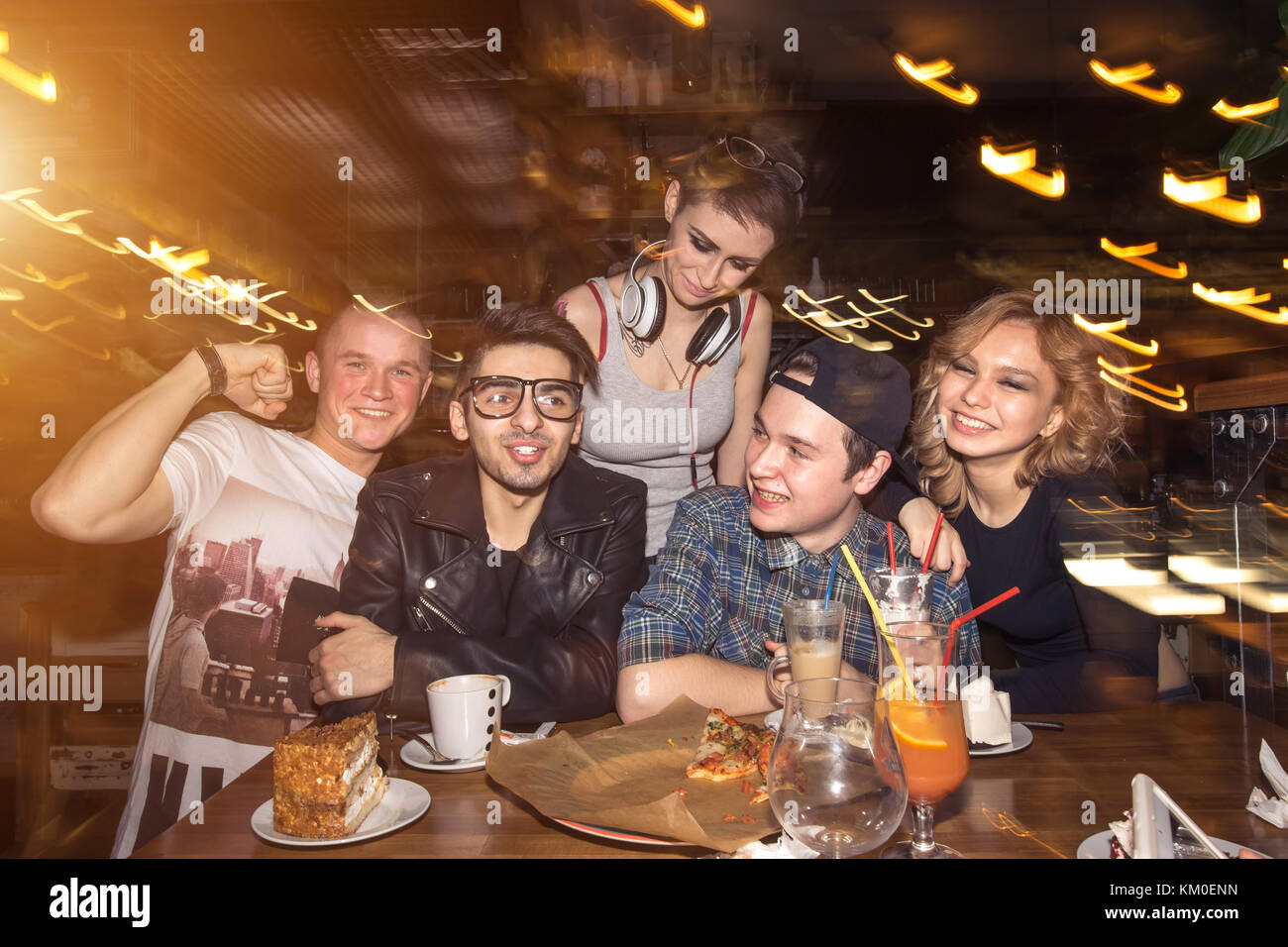 Friends Having Fun And Drinking Beer In Night Club Long Exposure Stock Photo Alamy